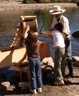 docents teaching children how miners worked in the 1800s