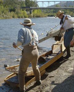 docents demonstrating mining technique, Coloma