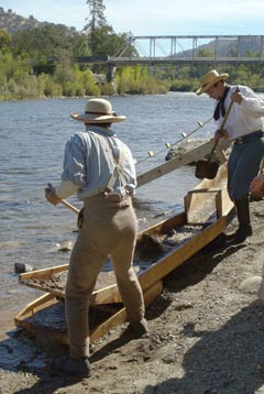 docents demonstrating mining technique, Coloma