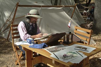 artist at the Gold Rush Live tent city